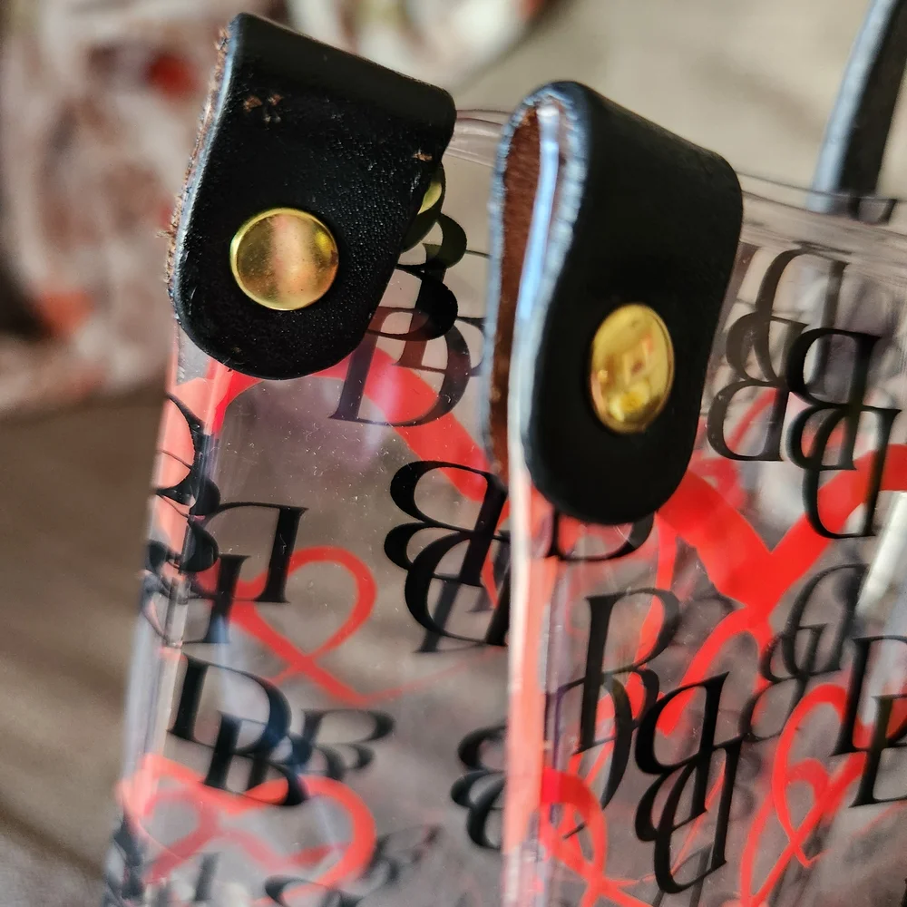 Dooney & Bourke Clear PVC Tote and Zip Pouch with Orange Heart Print - Picture 6 of 10